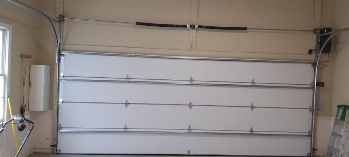 5 SIGNS OF A BROKEN GARAGE DOOR SPRING