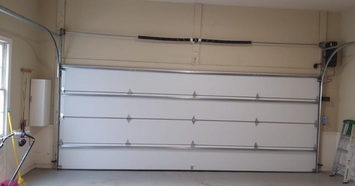 5 SIGNS OF A BROKEN GARAGE DOOR SPRING