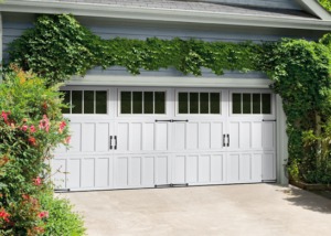 After New Garage Door Opener Installation on White double car garage - Austin & Round Rock - Gator Garage Doors
